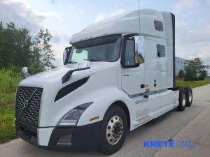 2021 VOLVO VNL64T heavymedium-duty-trucks-used-2021-volvo-vnl64t-1476074-driver-side-front-angle-Image